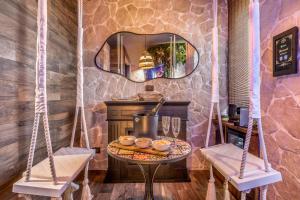 a room with a table and two chairs at Int 37 Luxury Rooms in Rome