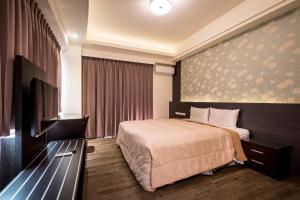 Μια τηλεόραση ή/και κέντρο ψυχαγωγίας στο Yundu Business Hotel