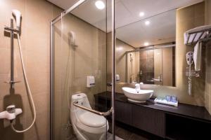 Ένα μπάνιο στο Yundu Business Hotel