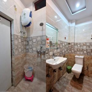 a bathroom with a toilet and a sink at Hotel Suraj in Raxaul