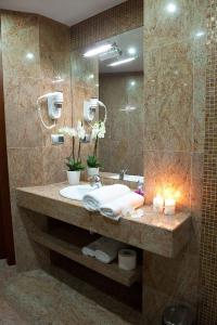 Koupelna v ubytování Hotel Amadeus