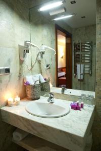Koupelna v ubytování Hotel Amadeus