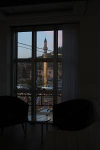 a view of a city from a window at Agušević Home in Novi Pazar