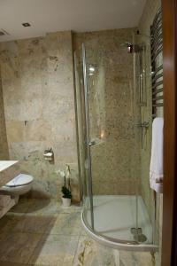 Koupelna v ubytování Hotel Amadeus