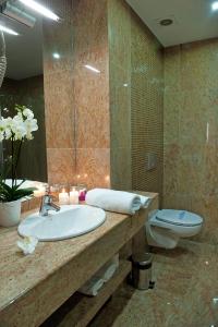 Koupelna v ubytování Hotel Amadeus