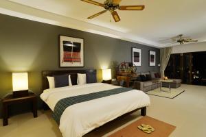 Ein Bett oder Betten in einem Zimmer der Unterkunft The Quarter Pai