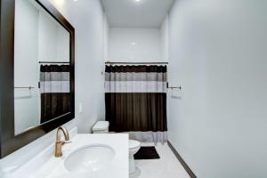 a bathroom with a sink and a toilet at Fairway in Altoona +65 photos