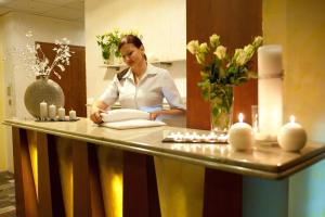 Členové personálu v ubytování Hotel Amadeus