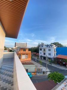a view from the balcony of a building at Nhà Nghỉ THÀNH LỘC in Long Hai