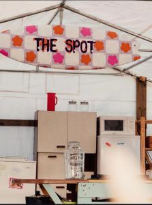 a sign that says the spot next to a refrigerator at Glamping Spot - Penmarch in Penmarch