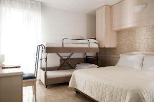 Lova arba lovos apgyvendinimo įstaigoje Hotel Villa Mare