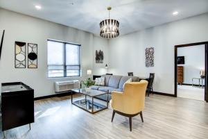 a living room with a couch and a table at Fairway in Altoona