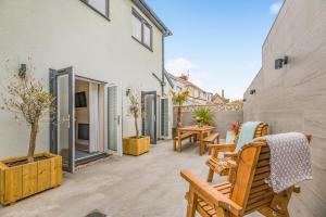 a patio with chairs and tables in a building at 3 Bed in Amble oc-h36627 in Amble