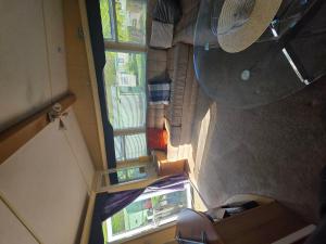 an overhead view of a room with a window at Twin Ayre Cabin Retreat Welshpool in Welshpool