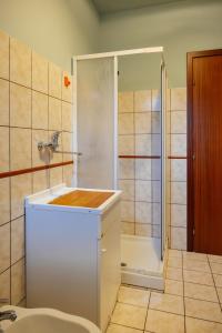 a bathroom with a shower and a sink at ll Paiolo Magico in Montella +29 photos