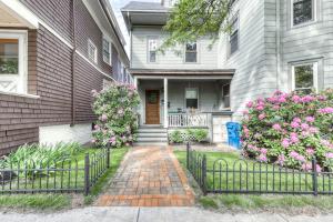 a house with a brick walkway in front of it at Morning on the Atlantic in Portland