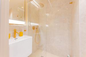 a bathroom with a shower and a sink at A2B Collection Arena in Valencia +47 photos