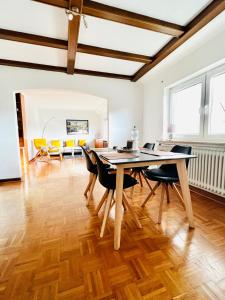 a dining room with a table and chairs at 3 sonnige Appartements in Soltau in Soltau