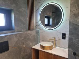 a bathroom with a sink and a mirror at Panorama Sudety in Nowa Bystrzyca +39 photos
