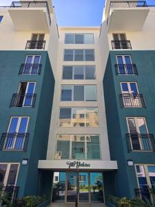 a building with a sign that reads first dance at Royal's 2 Bedroom suite in Kingston