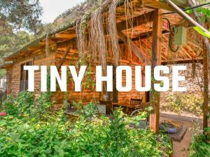 a tiny house with the words tiny house at Kidrak Camping NAMASTE in Faralya +19 photos