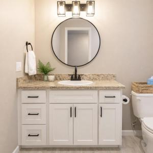 a bathroom with a sink and a mirror at Sequoia Oasis near Downtown Exeter in Exeter +8 photos