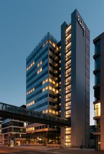 a building with a sign on the side of it at Ruby Luna Hotel Dusseldorf by IHG in Düsseldorf