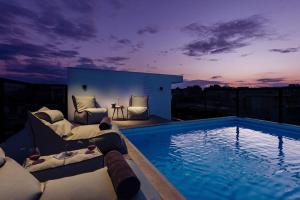 a view of a swimming pool on a building at Zea Urban Living in Piraeus