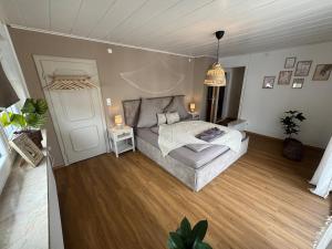 a bedroom with a bed in a room at BOHO Apartment Skye in Bad Reichenhall
