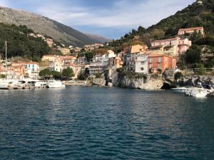 a town on the shore of a body of water at MARIMA' la Casa Vacanze - Holidays Suites in Maratea