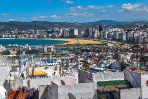 a view of a city from the fortress at Dar AL BARAKA in Tangier