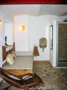 a room with a bed in the corner of a room at Mountain House With Sauna In Sachrang in Sachrang +12 photos
