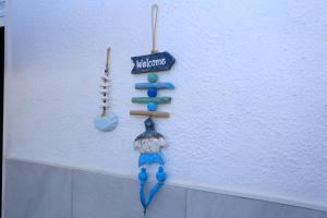 a wall with a christmas ornament on it at Billis Cologne Apartment in Flogita +20 photos