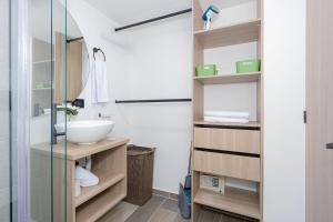 a bathroom with a sink and a mirror at Bit Building in Medellín +134 photos