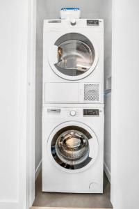 a white washer and dryer in a room at The Royal Suite in Surrey