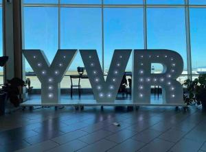 a large sign for the word rave in a building at The Royal Suite in Surrey