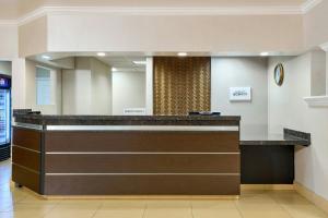 a lobby of a hospital with a reception counter at Residence Inn by Marriott Greenbelt in Greenbelt