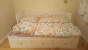 a bed with two pillows on top of it at Ferienwohnung an der Ostsee in Dassow