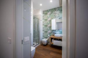 a bathroom with a toilet and a sink at Carlo's Luxury Villa in Agerola +68 photos
