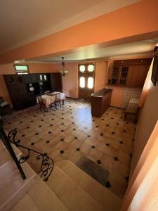 a view of a living room with a table and chairs at Rest house Keda in K'eda