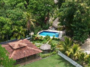an aerial view of a resort with a swimming pool at EcoHotel Inka Minka in Santa Marta