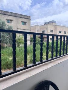 a balcony with a view of a building at Saeeds apartment in Ajloun