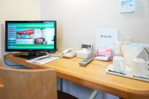TV a/nebo společenská místnost v ubytování Hotel Select Inn Sano-Ekimae