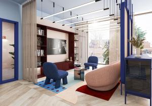 a living room with two chairs and a tv at For Students Only - Central Studios in Reading in Reading