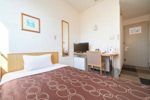 Postel nebo postele na pokoji v ubytování Hotel Select Inn Sano-Ekimae + 37 fotografií