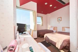 TV a/nebo společenská místnost v ubytování Hotel Select Inn Sano-Ekimae