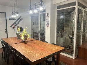 a wooden table in a room with a dining room at Anabelle Residence in Dumaguete +11 photos