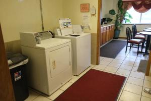 a room with a washer and dryer in a store at FairBridge Inn Express Chesterton in Chesterton