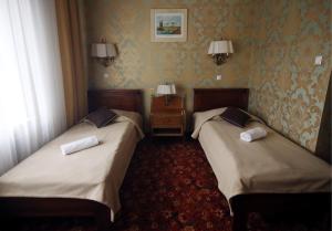 Posteľ alebo postele v izbe v ubytovaní Hotel Plock