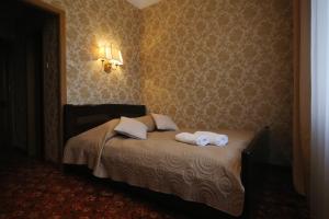 Posteľ alebo postele v izbe v ubytovaní Hotel Plock